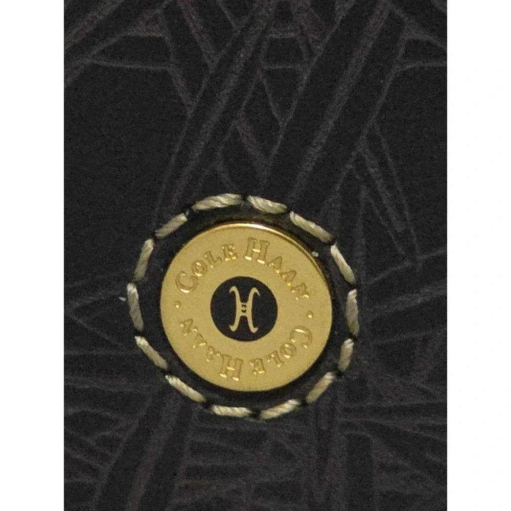 Cole Haan Black Bifold Men's Wallet with Emblem Logo and Outside Design